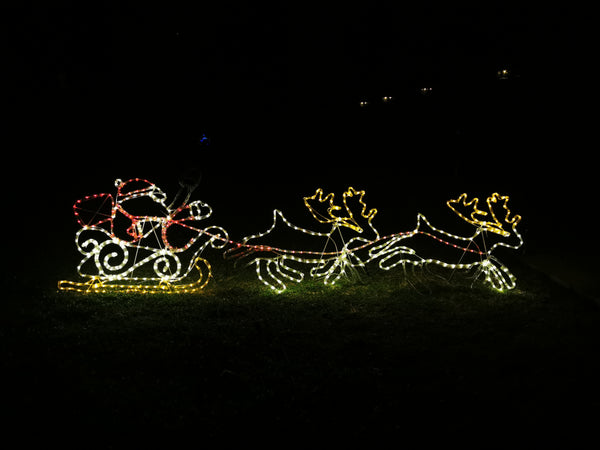 Christmas LED Animated Motif Santa Riding Reindeers in Sleigh 210x70cm Outdoor