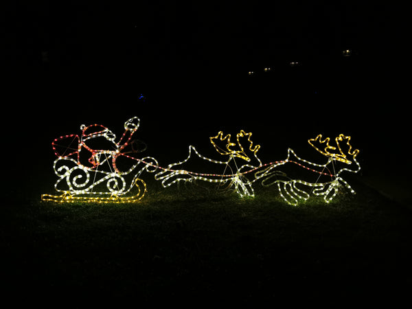 Christmas LED Animated Motif Santa Riding Reindeers in Sleigh 210x70cm Outdoor